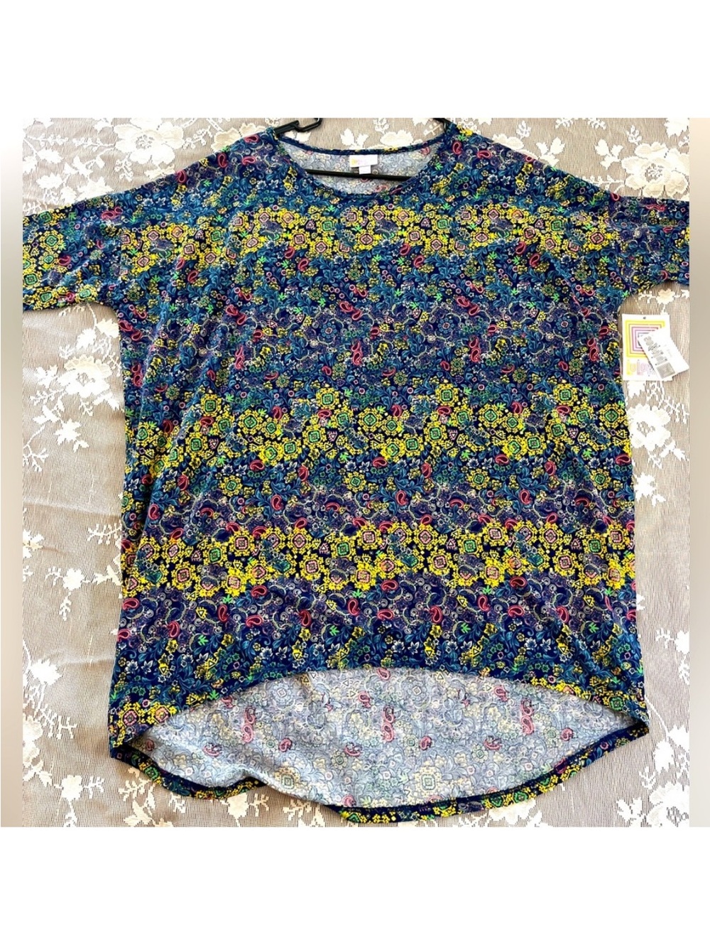 LuLaRoe Short Sleeve Tee in Navy Blue with Yellow & Green Floral Pattern Size L